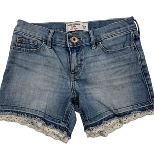 abercrombie kids faded blue denim shorts with white lace hem